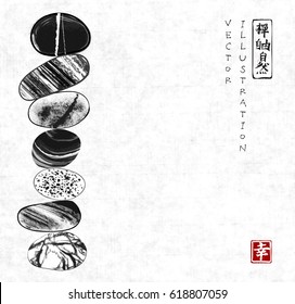 Pebble zen stones balance on rice paper background. Traditional Japanese ink painting sumi-e. Contains hieroglyphs - zen, freedom, nature, happiness