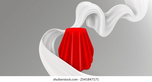 Pedestal draped with red curtain and flowing white curve fabric on grey background. Elegant silky material creates wave shape around covered stand. Presentation setup for luxury product displays.