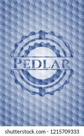 Pedlar blue badge with geometric pattern.