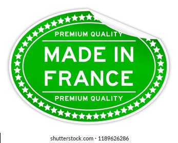Peel off premium quality made in France word green color oval sticker on white background