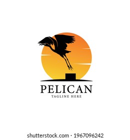 pelican bird logo vintage with sun background vector illustration design