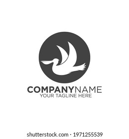 Pelican logo on dark circle background. Bird icon