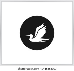 Pelican on the moon background. Bird icon