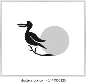 Pelicans in front of the moon. pelican icon