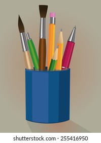 A pen holder with pencils pens and paintbrushes