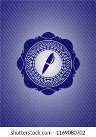 pen icon inside badge with jean texture
