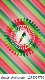 pen icon inside christmas badge.