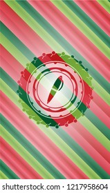 pen icon inside christmas colors badge.