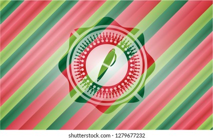 pen icon inside christmas style badge..