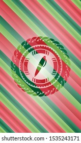 pen icon inside christmas style badge..