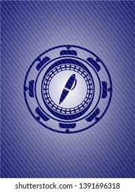 pen icon inside emblem with denim texture