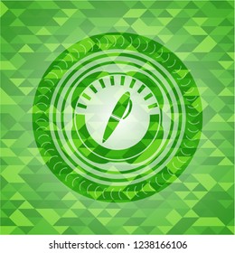 pen icon inside green emblem with mosaic background