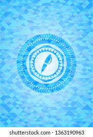 pen icon inside light blue emblem with triangle mosaic background