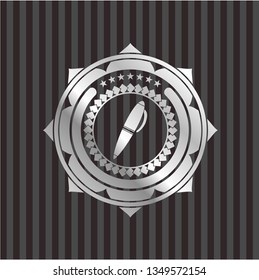 pen icon inside silvery emblem