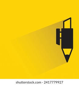 pen icon with shadow on yellow background