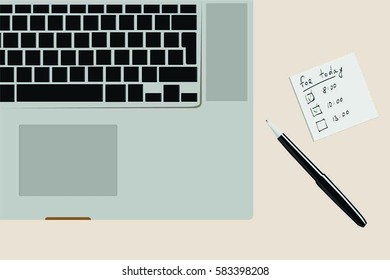A pen with textbook near the computer. View from above.