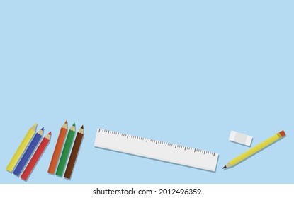 pencil eraser ruler and colored pencils on light blue background