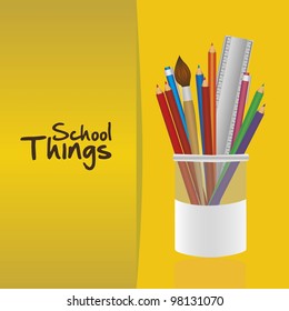 pencil handler with colored pencils over yellow background