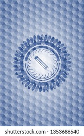 pencil icon inside blue emblem with geometric pattern background.