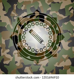 pencil icon inside camouflaged emblem