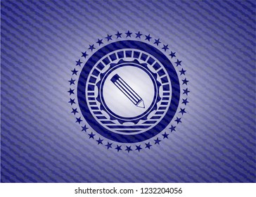 pencil icon inside emblem with jean texture