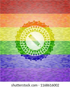 pencil icon inside emblem on mosaic background with the colors of the LGBT flag
