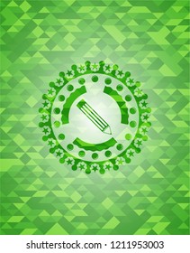 pencil icon inside green emblem with triangle mosaic background