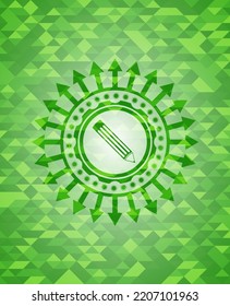 pencil icon inside green mosaic emblem. 