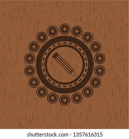 pencil icon inside retro style wooden emblem