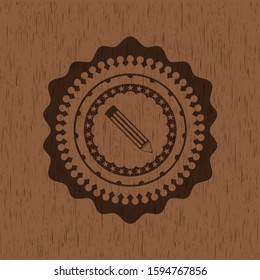 pencil icon inside wood emblem