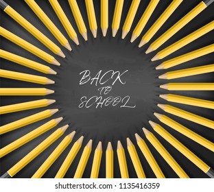 Pencil with shadow on blackboard background. Back to School.