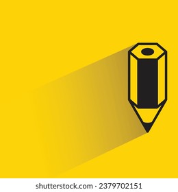 pencil with shadow on yellow background