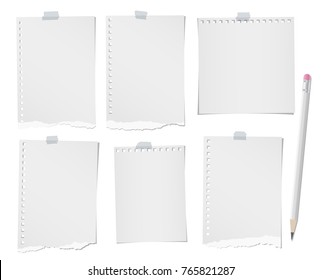 Pencil and torn ruled, blank note, notebook, paper sheets for text or message stuck with sticky tape on white background.