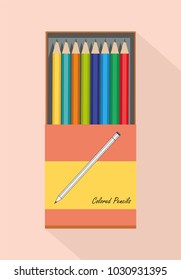 ?olor pencils in a box isolated on pink background	
