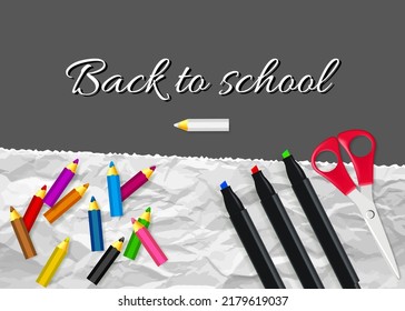 Pencils, markers, and scissors in realistic style. Back to school text. Сhalk lettering on blackboard