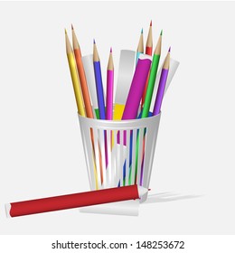 Pencils and pens with cup.
