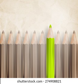 Pencils with tips facing upwards against parchment textured paper. EPS 10 vector file included