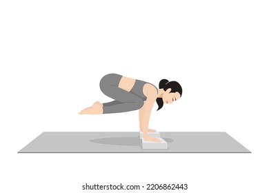 Pendant Pose Block. Beautiful girl practice Lolasana Blocks. Young attractive woman practicing yoga exercise. working out, black wearing sportswear, grey pants and top, indoor full length, calmness