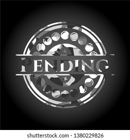 Pending grey camouflage emblem