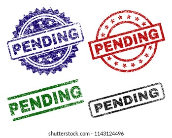 PENDING seal imprints with corroded texture. Black, green,red,blue vector rubber prints of PENDING title with scratched texture. Rubber seals with circle, rectangle, medallion shapes.