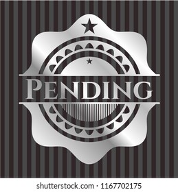 Pending silver badge or emblem