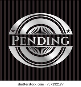 Pending silvery badge