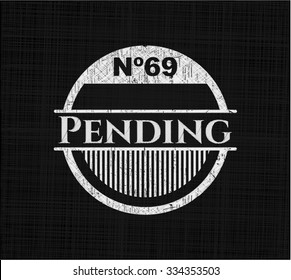 Pending written on a blackboard