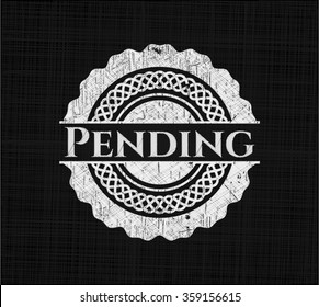 Pending written on a blackboard