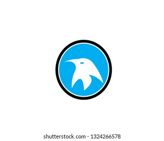 Penguin black silhouette vector logo. Side view of a standing penguin.- Vector
