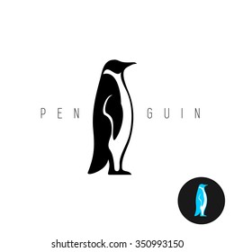 Penguin black silhouette vector logo. Side view of a standing penguin.