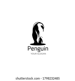 vector de logotipo de silueta de cuidado del pingüino