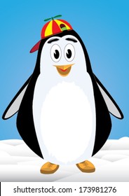 Penguin child with bonnet above the snow