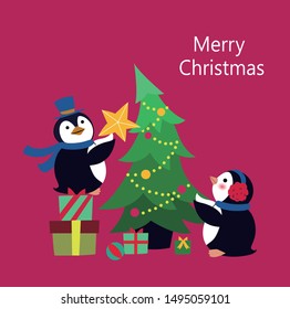 Penguin decorating the Christmas tree