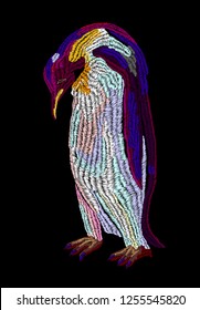Penguin in embroidery style, black background. Vector